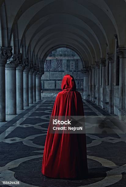 Woman In Red Cloak Walking Away Stock Photo - Download Image Now - Cape - Garment, Women, One Woman Only