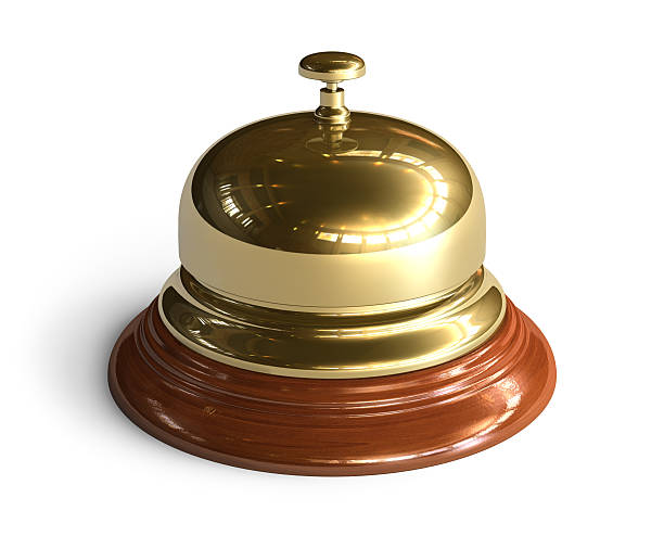 A gold reception bell waiting to be rung