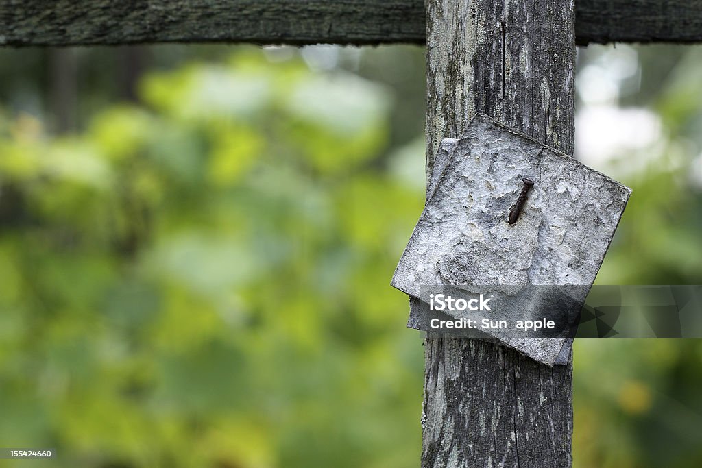 Blank sign in garden Blank sign nailed to a wooden board in garden Blank Sign Stock Photo