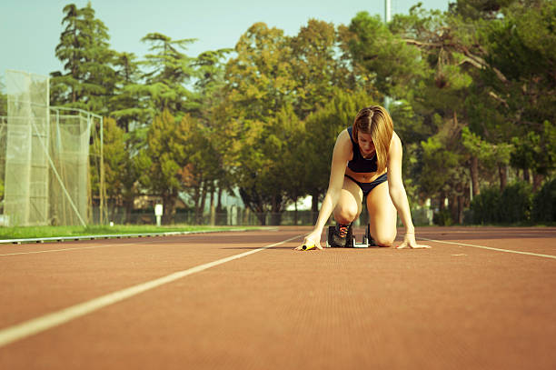 istock Young woman ready for a running race 155426043