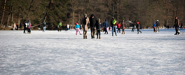 istock walking on a frozen lake 155427329