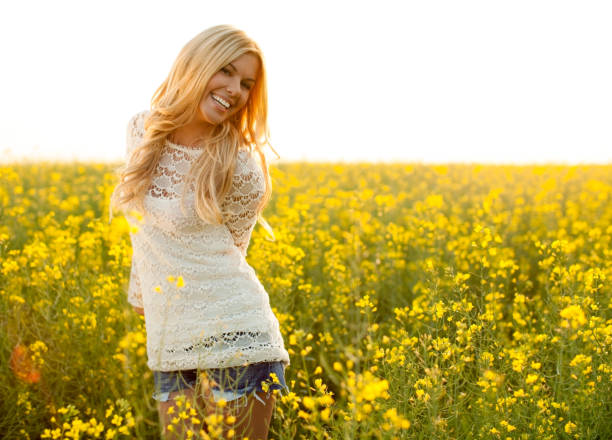 istock Girl in the flowers 155428040