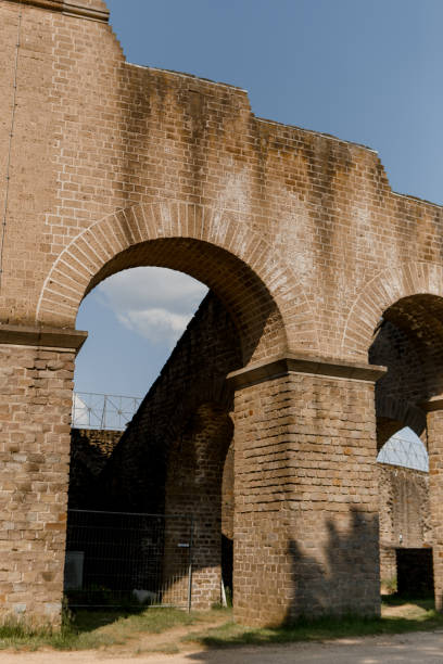 istock ancient roman greek arena architecture large arches 1554281600