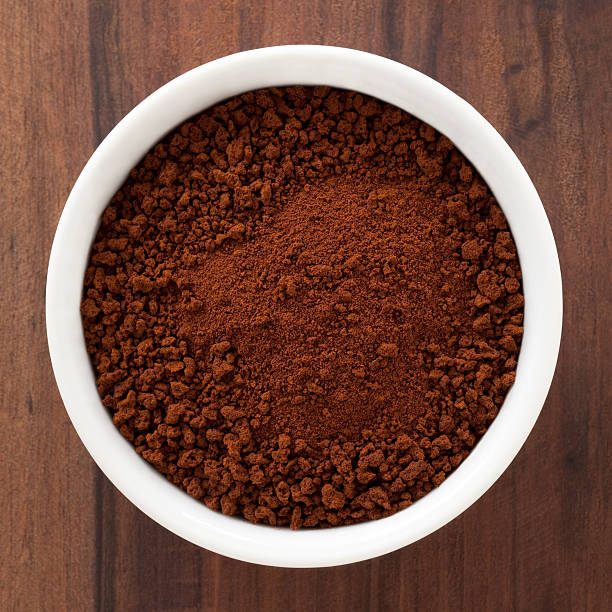 Instant coffee Top view of white bowl full of instant coffee instant coffee stock pictures, royalty-free photos & images