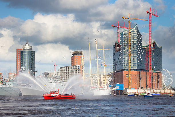 Fire ship in front of the mondern Hafencity on the harbours birthday in Hamburg 2012 - Germany - Taken with Canon 5Dmk2