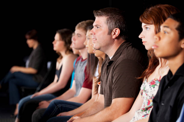 istock Large diverse audience of high school students and teacher 155428476