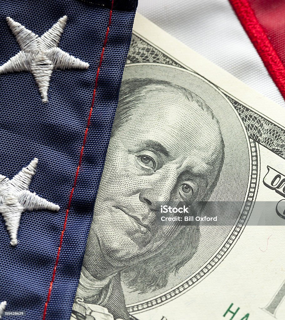 Money and Flag Close-up of Money and Flag. Government Stock Photo