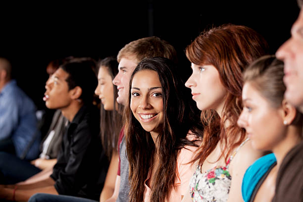 istock Audience members: large diverse group of teenagers 155428639