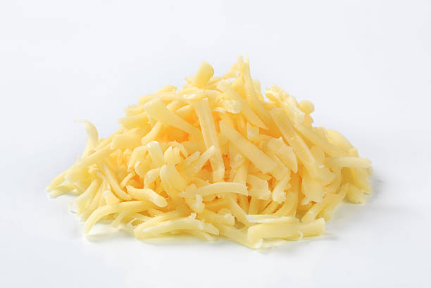 Heap of grated cheese stock photo