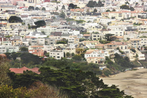 The Sunset - Outer Sunset - Westlake District areas of San Francisco, which transition to Daly City, Colma, Serramonte and South San Francisco, or the Industrial City - residential communities sprawling upward from the beach onto the hillside,  San Francisco, California, 2012.