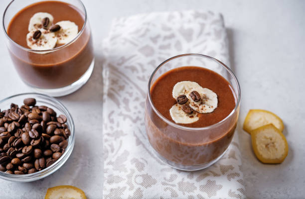 istock Coffee banana smoothie in a glass 1554288889