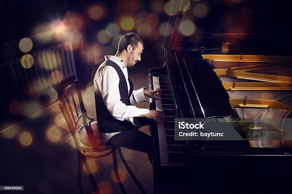 Del Pianista - Foto stock royalty-free di Giocare