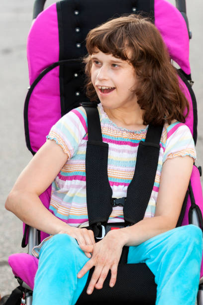istock Smiling tween in wheelchair 155429018