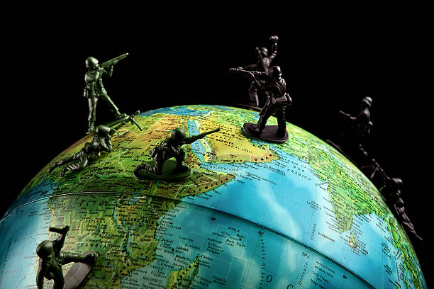 istock Globe toy soldiers war concepts 155429254