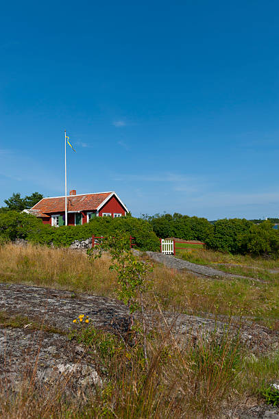 Cute little cottage in the archipelago stock photo