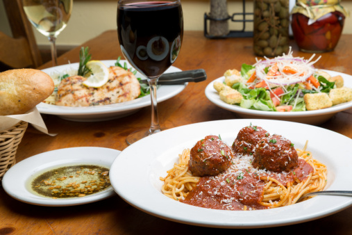 Spaghetti and Meatballs with Salad and wine