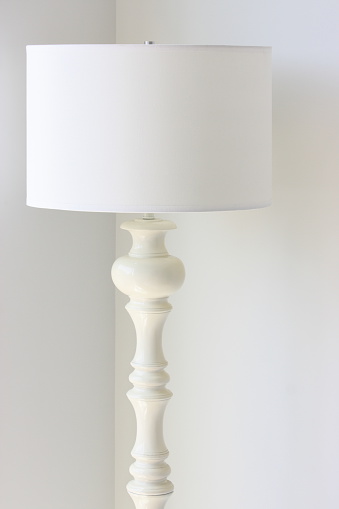 Table lamp in modern contemporary style. Stylish table lamp isolated on white background.