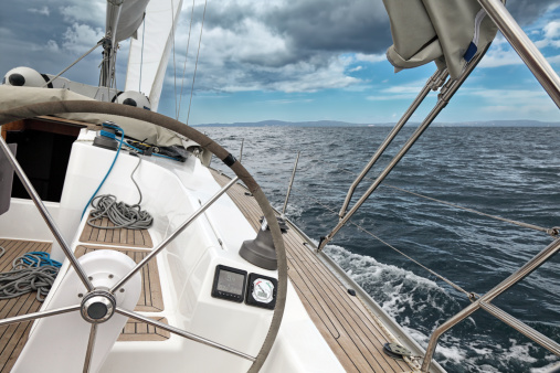 Sail of a sailing boat against sky