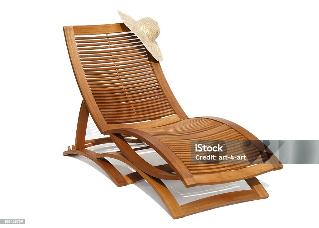 Wooden sunbead on white background Wooden sunbead with hat on white background Lounge Chair Stock Photo
