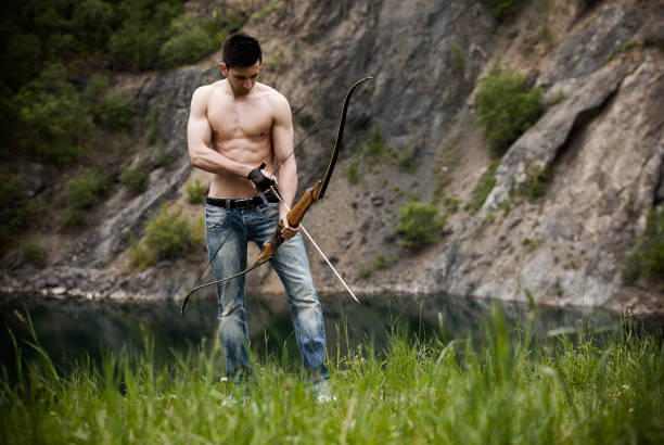 istock Archer in beautiful landscape 155429788