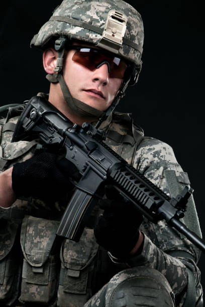 istock American Soldier With Rifle 155429824