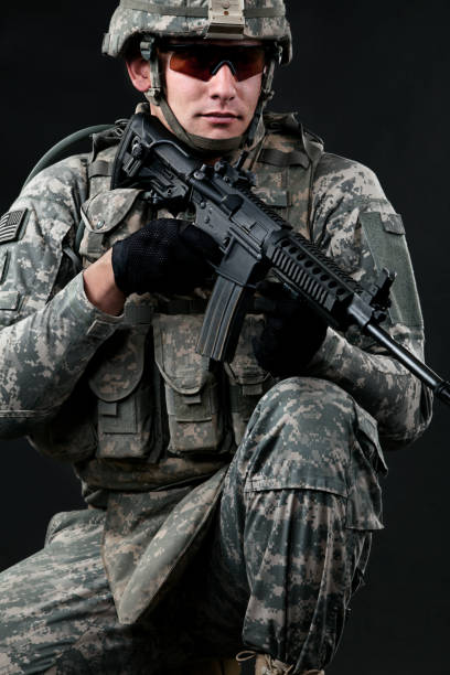 istock American Soldier With Rifle 155429830