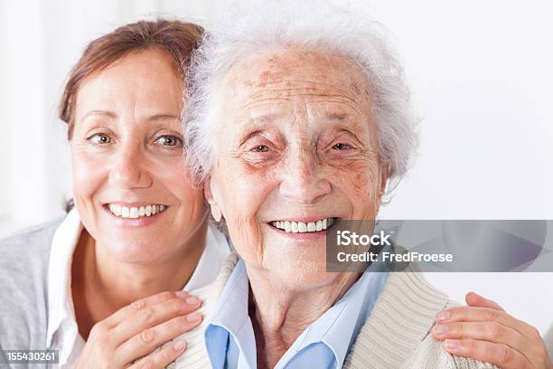 Senior Woman And Caregiver Stock Photo - Download Image Now - 80-89 Years, A Helping Hand, Active Seniors