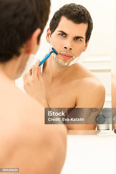 Young Man Shaving Stock Photo - Download Image Now - 20-29 Years, Adult, Adults Only