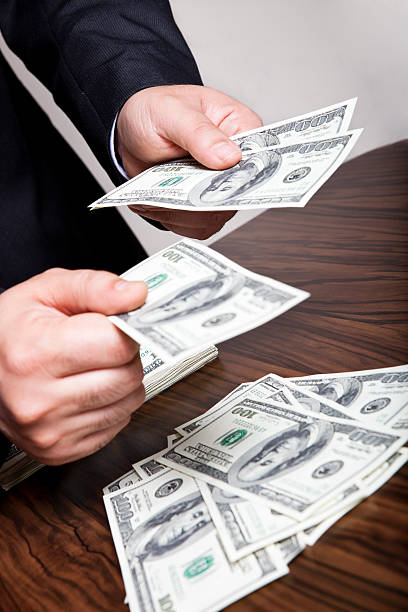 istock Giving money 155430823
