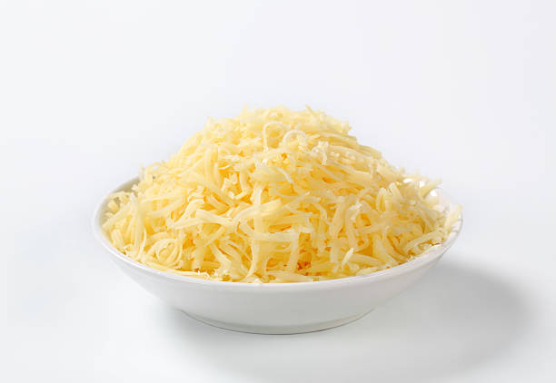 queso rallados - grated fotografías e imágenes de stock