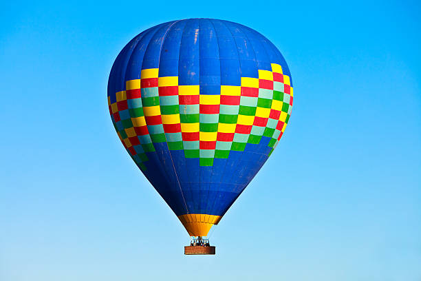 istock Hot air balloon floating through the sky 155431108