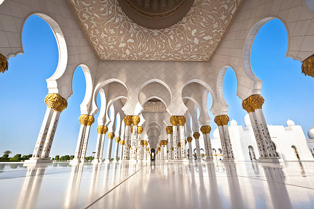 Mosque in Abu Dhabi with white pillars famous sheikh zayed grand mosque. abu dhabi, united arab emirates. abu dhabi stock pictures, royalty-free photos & images