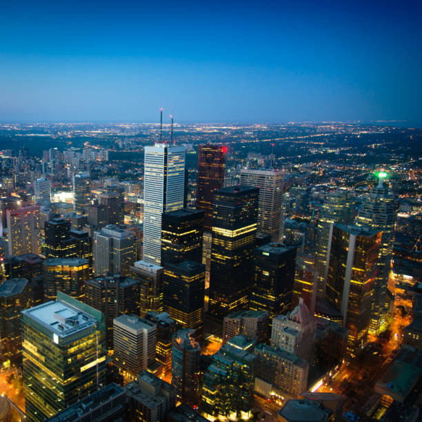 View over beautiful illuminated Toronto Skyscrapers, Downtown and the Financial District from above at Twilight. Toronto, Ontario, Canada.