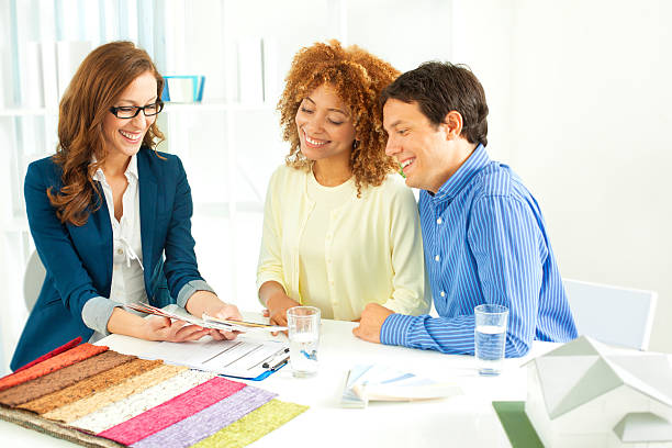 istock Couple Meeting with Interior Designer 155431637