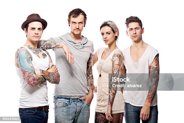 Young Group Of Tattooed Adultos Foto de stock y más banco de imágenes de Recortable - Recortable, Tatuaje, Cuatro personas