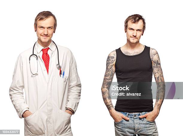 Portrait Of A Tattooed Doctor Stock Photo - Download Image Now - Individuality, Multiple Image, Tattoo