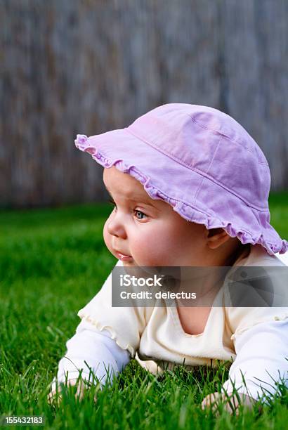 Baby Girl On The Grass Stock Photo - Download Image Now - 0-11 Months, 2-5 Months, 6-11 Months