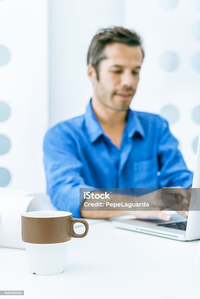 Businessman using laptop Businessman using laptop. 30-34 Years Stock Photo