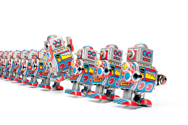 のおもちゃのロボット marching 錫 - robot conformity toy retro revival ストックフォトと画像