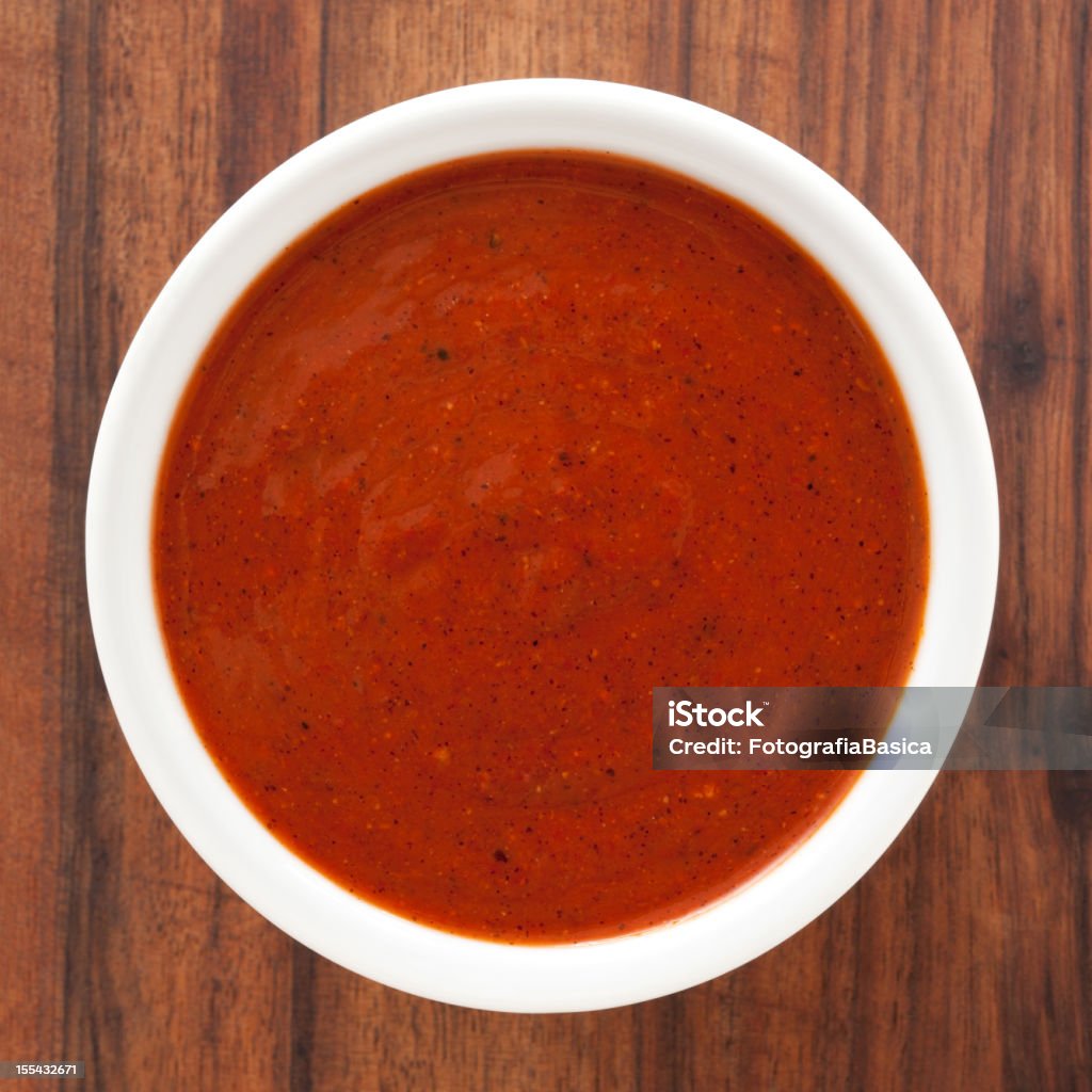 Red hot chili sauce Top view of white bowl full of chili sauce Bowl Stock Photo