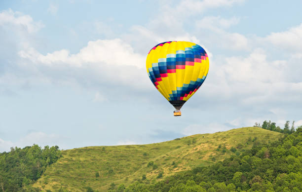istock Hot air balloon in a blue sky 155432698