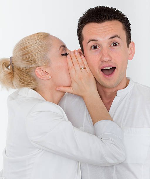 istock Young couple in secret communication 155432770