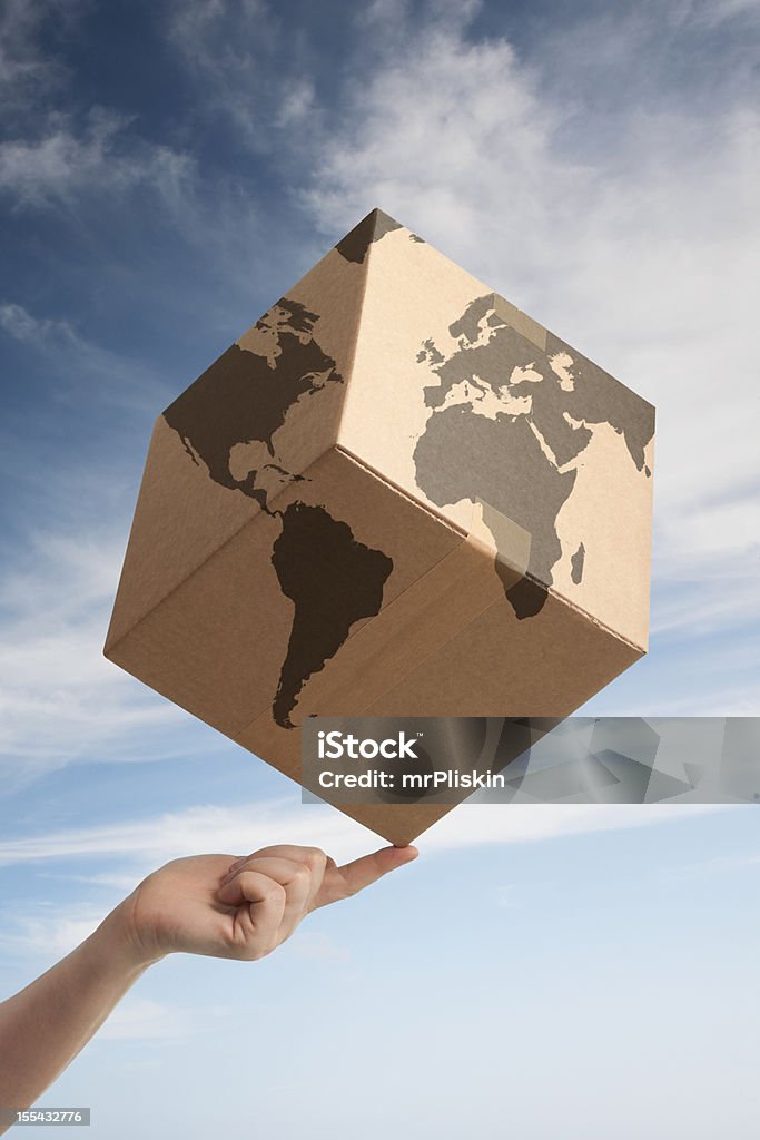 Equilíbrio do comércio mundial Caixa de Papelão e Mapa do Mundo - Royalty-free Global Foto de stock