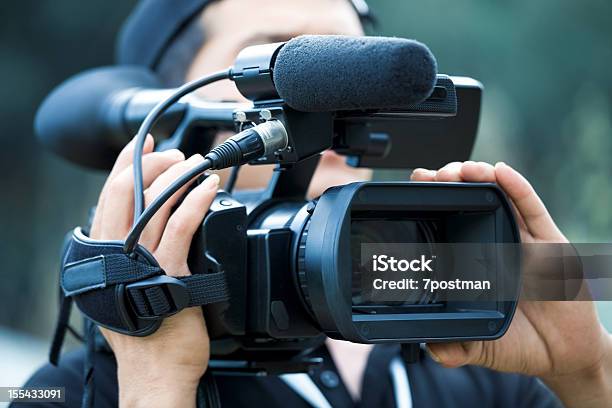 Filming Stock Photo - Download Image Now - Reality TV, Camera Operator, Home Video Camera