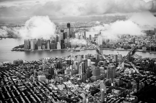 Aerial view of Manhattan among clouds, New York.