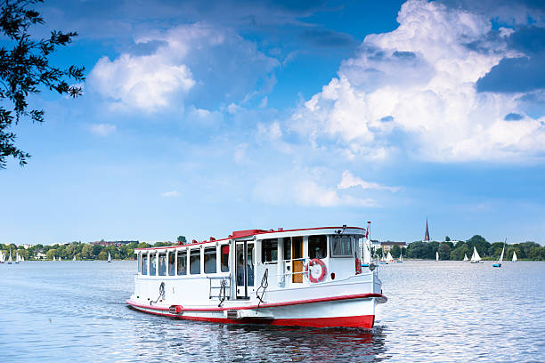 Alsterdampfer on the Alsterlake I LOVE HAMBURG: Alsterlake with Alsterdampfer in Hamburg - Germany - Taken with Canon 5Dmk3 aussenalster lake stock pictures, royalty-free photos & images