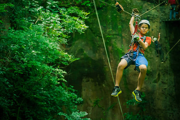 istock kid during a Canopy Tour in Costa Rica 155437498