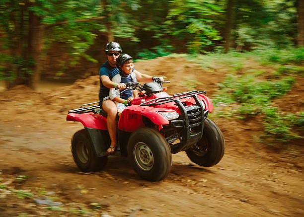 istock driving four wheelers in costa rica 155438111