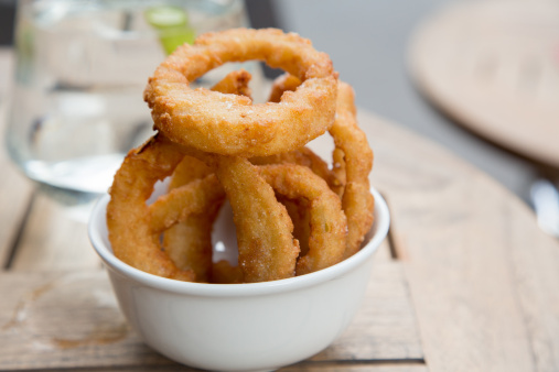 Thick cut onion rings in a dish