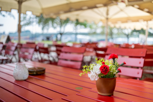 Outdoor Cafe Table Setting with flower vase